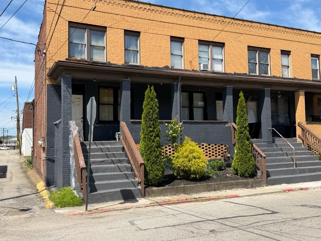 Exterior of home after Set2 Go renovation — fresh paint, new trim, and updated curb appeal